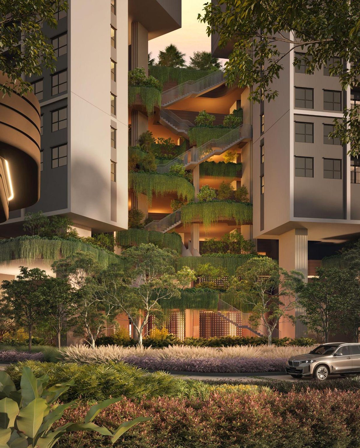 Planted vertical architectural opening framed by the building façade